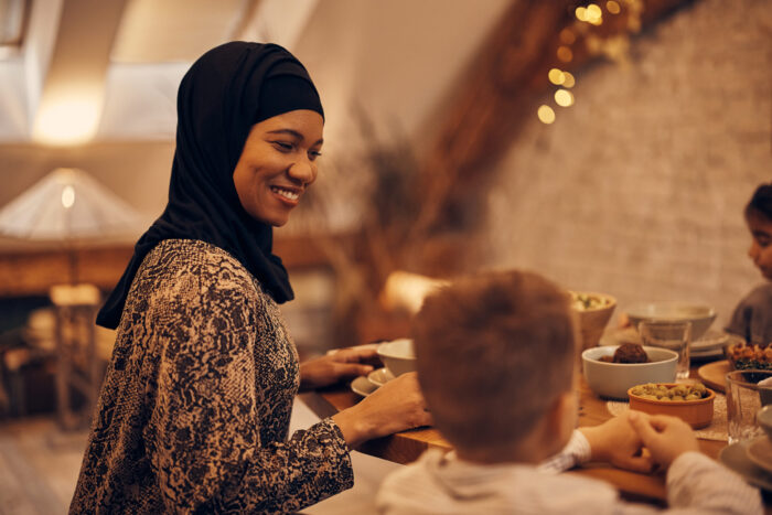 Muslim woman enjoying a meal