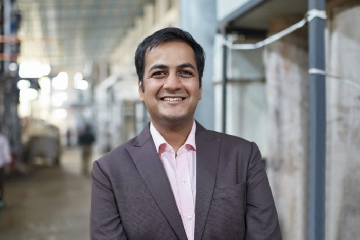 Smiling South Asian businessman