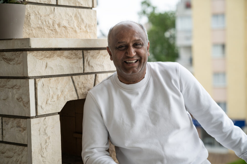 Muslim man relaxing outdoors