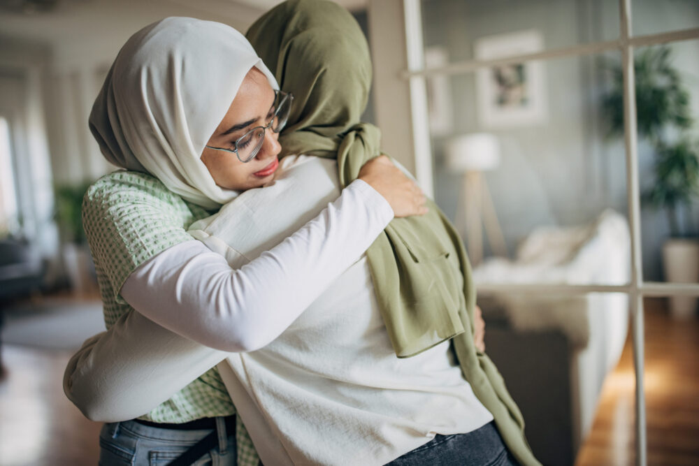 Women hugging