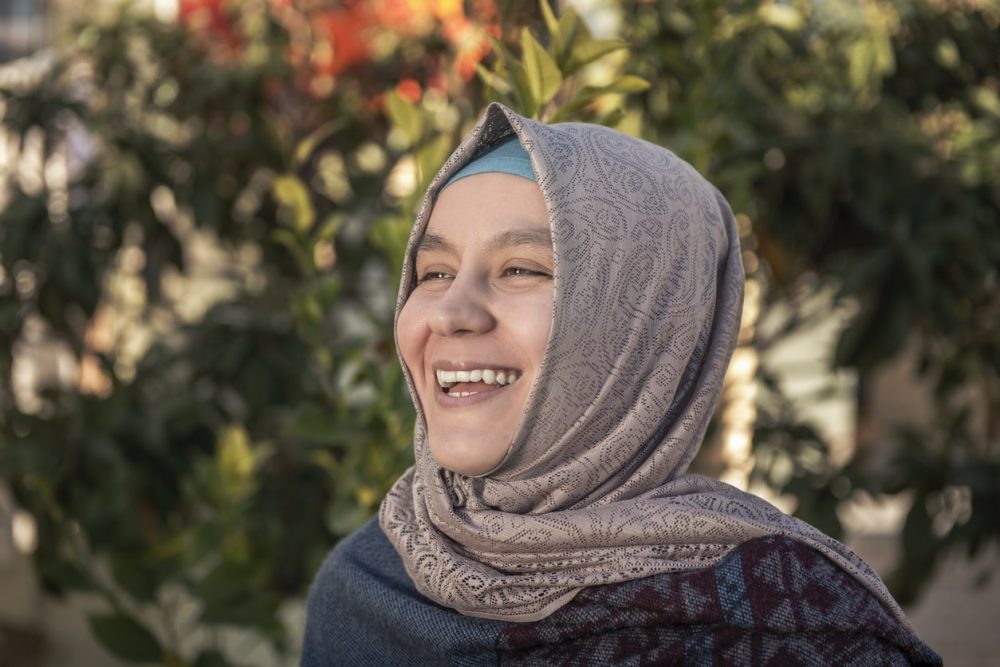 Laughing Muslim woman