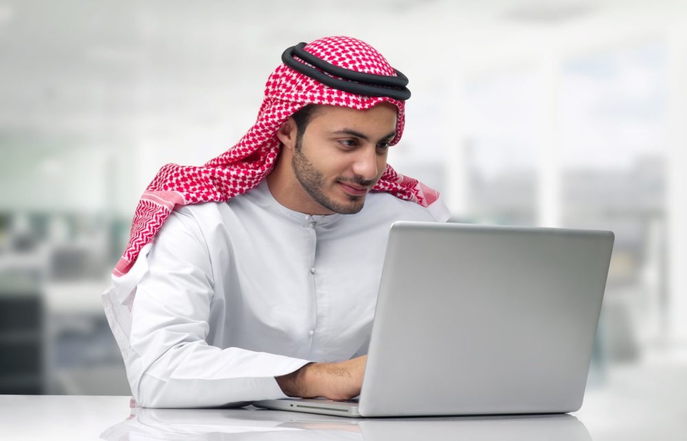 Muslim Man on Laptop