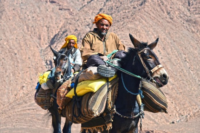 North African Men Riding