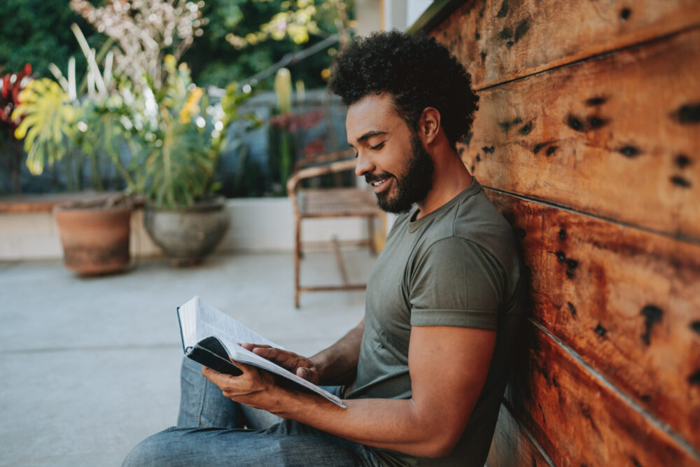 Young man reading the Bible