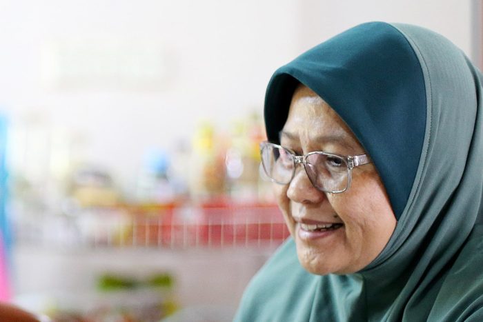 Smiling Elderly Muslim Woman