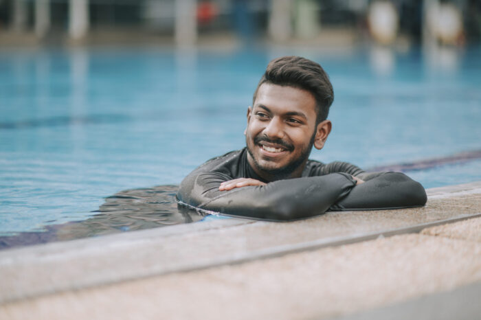 Middle Eastern man in pool