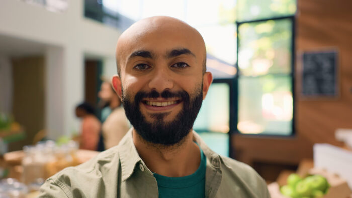 Smiling man in shop