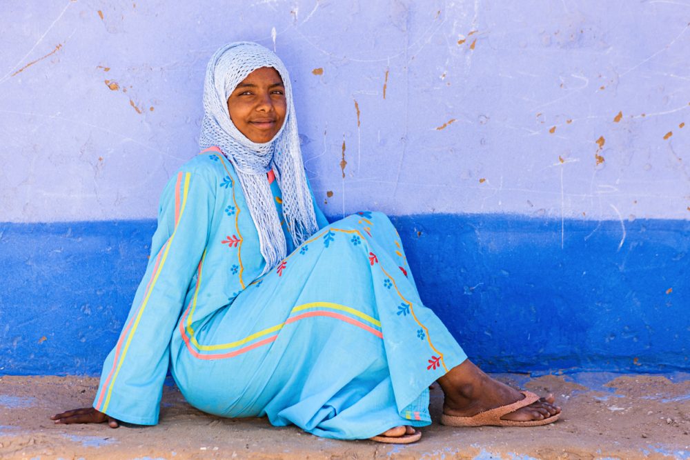 Young Muslim woman in blue dress