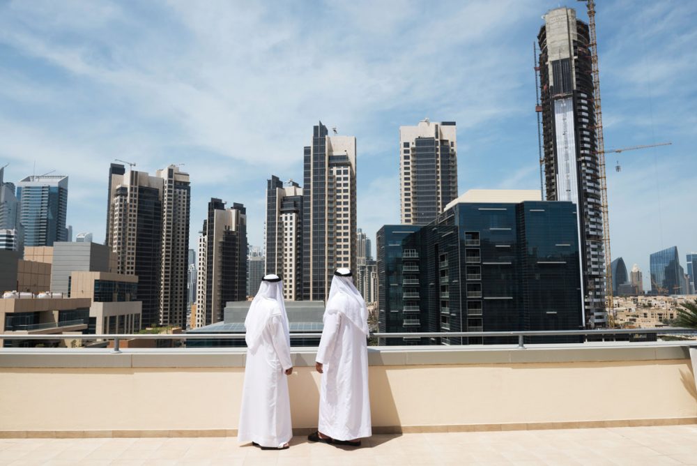 Two Arab men in Arab Gulf city