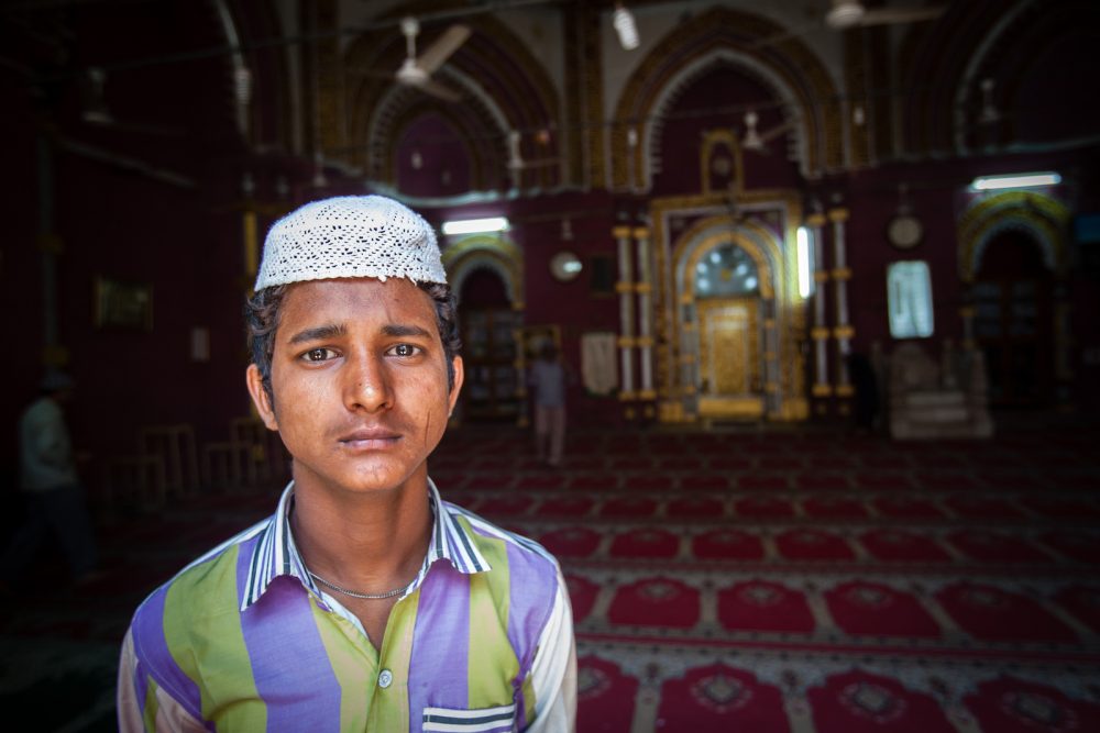 young man in a mosque