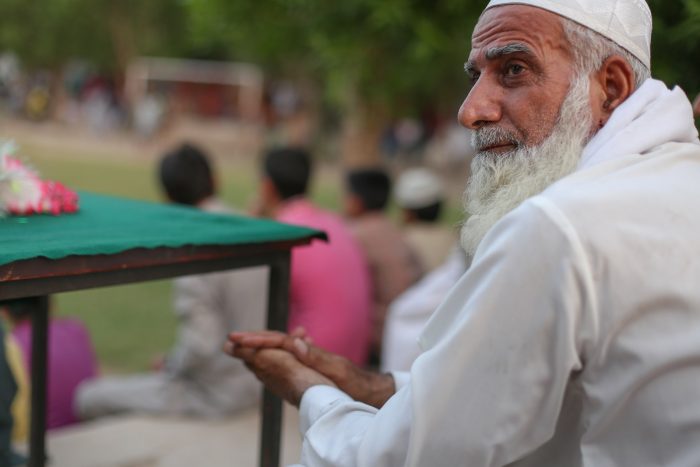 mature man in a white cap