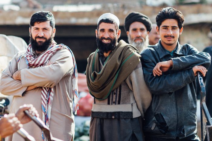 Muslim men in a marketplace