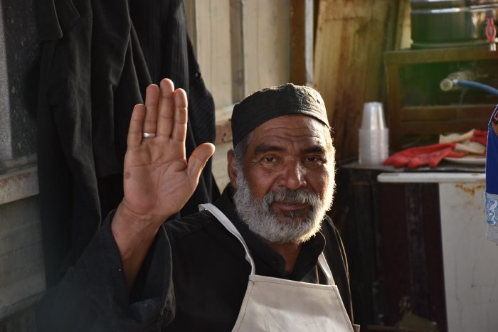 Muslim man cooking