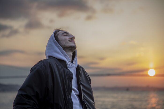 Young man by the ocean