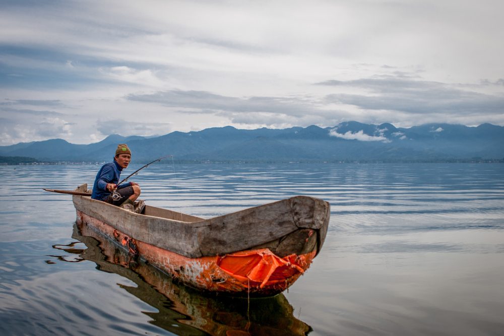 Indonesian man on a boat