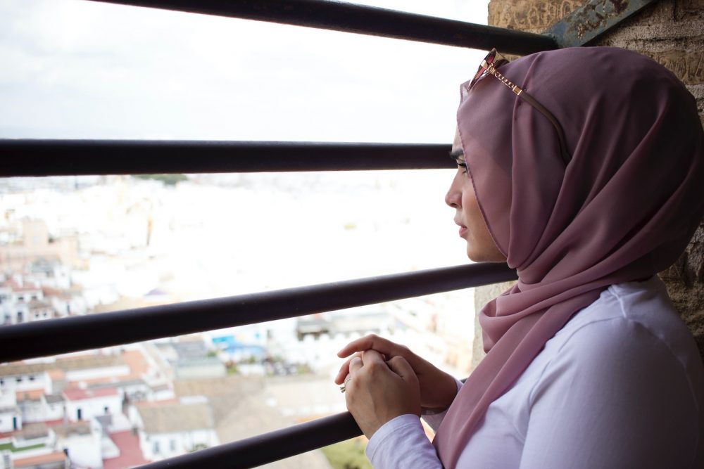 Muslim woman looking into the distance
