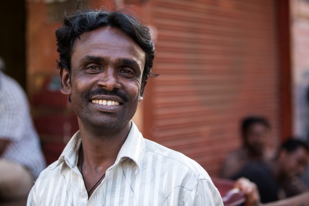 Smiling man in South Asia