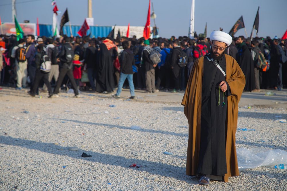 Muslim cleric near crowd