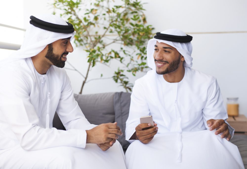 Two Arab men in conversation