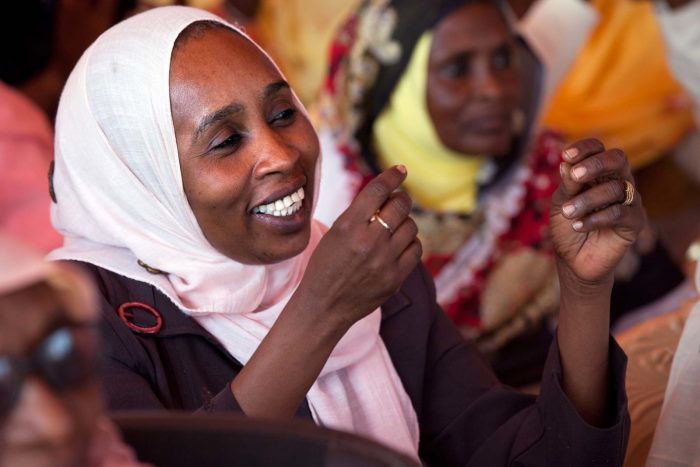 Muslim woman dancing in a village