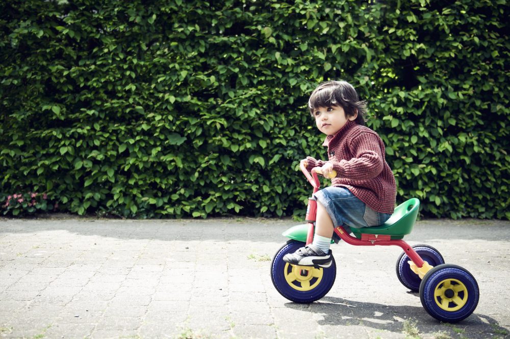 little boy on his bike